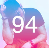 a man with his hands on his head and the number 94