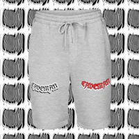 a pair of grey sweat shorts with red and black letters on them