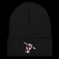 a black beanie with a knife embroidered on it