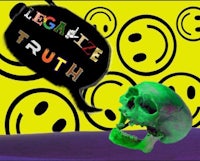 a green skull with a smiley face and the words legalize truth
