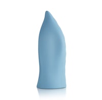 a blue plastic toy on a white surface
