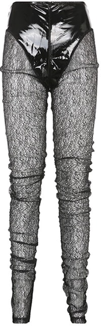 a woman's leggings with lace and netting