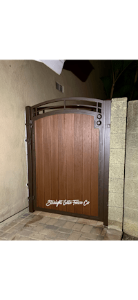 a wooden gate with a wooden frame