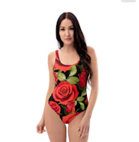 a woman wearing a one piece swimsuit with roses on it