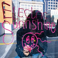 a man writing on a window