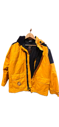 a yellow jacket hanging on a hanger
