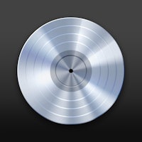 a silver disc on a black background