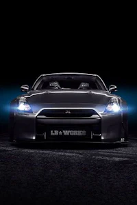the nissan gtr is shown in the dark