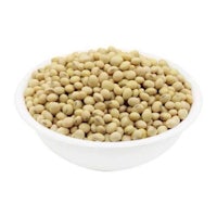 soy beans in a bowl on a white background