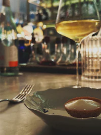 a glass of wine on a table