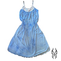 a blue dress with lace and a tattoo on it