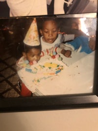a picture of a birthday cake with two children in it