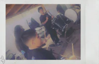 polaroid of a group of people playing drums