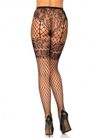 the back view of a woman in black fishnet stockings