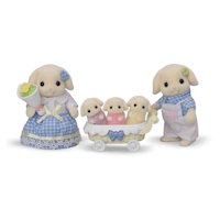 a figurine of a family of rabbits in a carriage