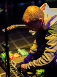 a man wearing a gray sweatshirt