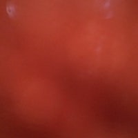a close up image of a red object