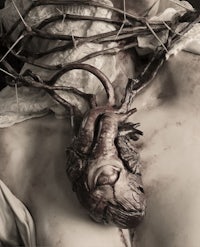 a woman's heart is covered in thorns