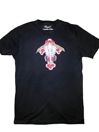 a black t - shirt with a cross on it