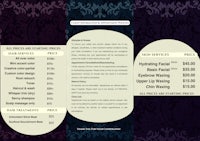a black and purple menu with prices on it