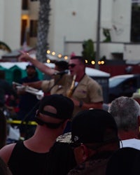 a man is playing a guitar