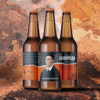 three bottles of beer with an image of a man on them