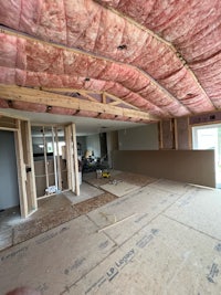 the inside of a house being remodeled with insulation