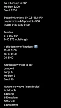 a black screen with a price list on it