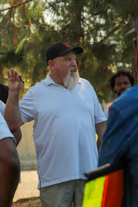 a man wearing a white t-shirt