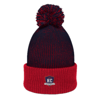a red and navy beanie with a pom pom