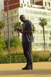 a man looking at his cell phone