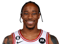 a basketball player with tattoos and dreadlocks