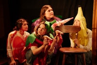 a group of women dressed up in banana costumes