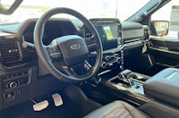 the interior of a ford f - 150 truck