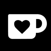 a coffee cup with a heart on it
