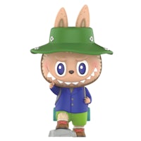 a figurine of a bunny wearing a hat and a hat