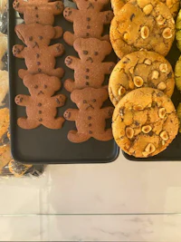 a tray of cookies with teddy bears on it