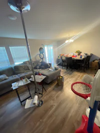 a view of a living room with a basketball hoop