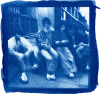 a photo of a group of people sitting on a bench