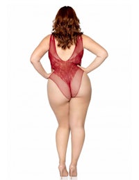 the back view of a woman in a red lace bodysuit
