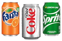 three cans of soda with orange, lemon, and sprite