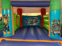 paw patrol bouncy castle in a store