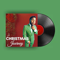 the cover of a christmas journey with a man in a green suit