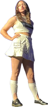 a woman in a white skirt posing for a photo