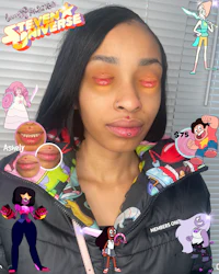 a girl with a lot of cartoon characters on her face