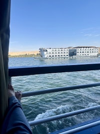 a view of the nile river from the deck of a cruise ship