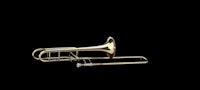 a trombone on a black background
