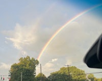a double rainbow in the sky
