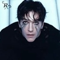 a man in black with a black mask on his face