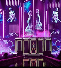 an image of a stage with a woman on it